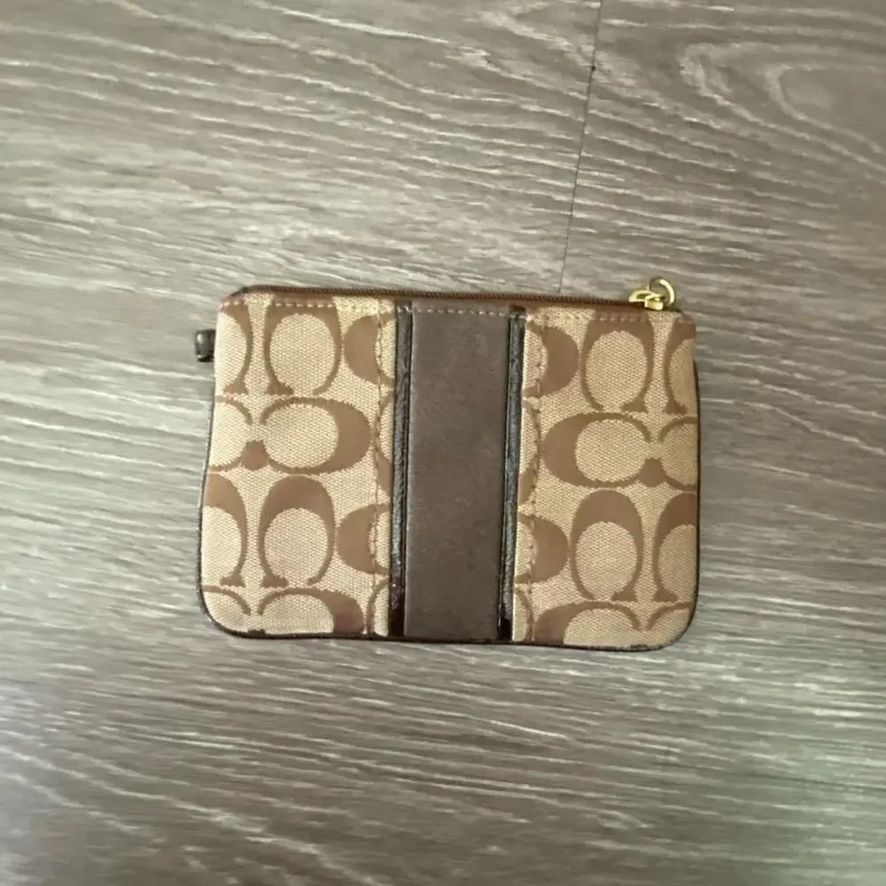 Mid 2010s coach archive signature wristlet clutch wallet